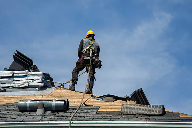 Professional Roof Replacement technician working in Opa-locka, FL